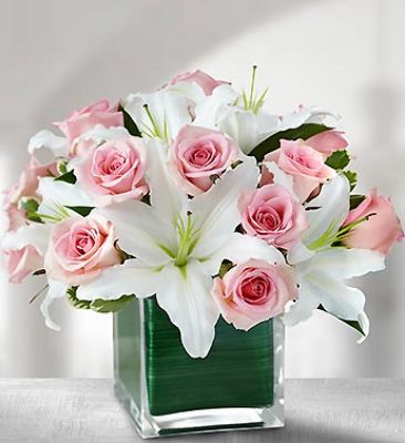 Lilies and pink roses