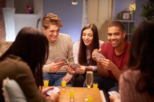 Playing Card Games in New Year Night